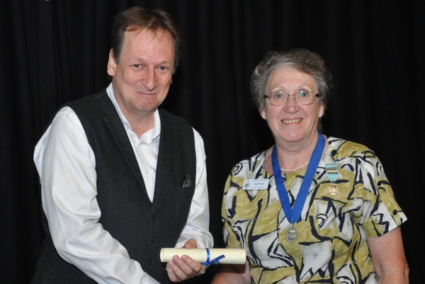Someone awarded a certificate for something!